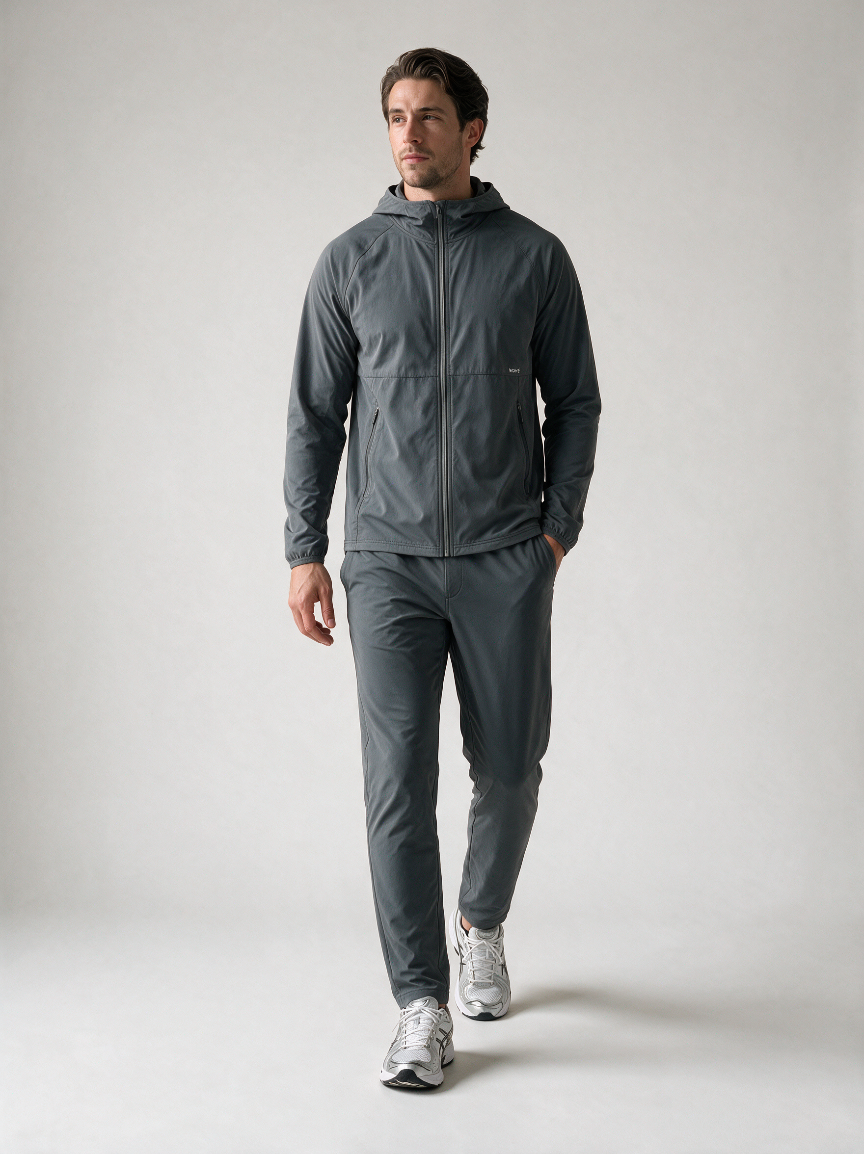 Man wearing the Steel Motion jacket and track pants